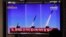 People watch a TV screen airing reports about North Korea's firing missiles with file images of missiles at the Seoul Railway Station in Seoul, South Korea, April 14, 2020.