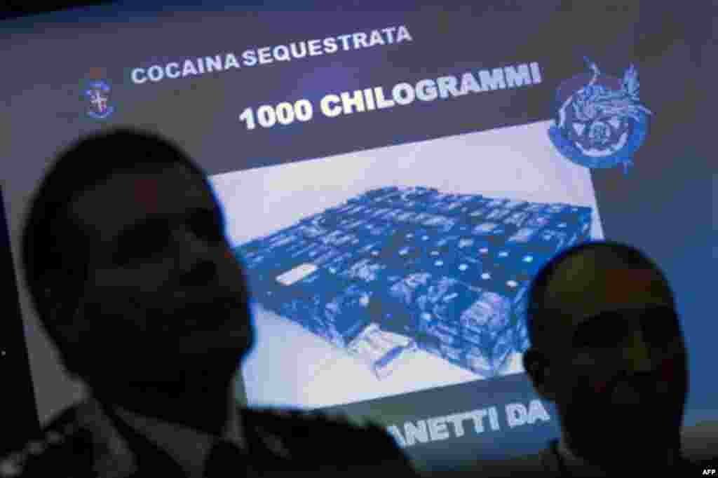 A picture showing part of 1,000 kilograms (2,200 pounds) of pure cocaine seized by the Italian police is shown to journalists during a press conference in Rome, Monday, Nov. 15, 2010. Italian police have seized 1,000 kilograms (2,200 pounds) of pure cocai