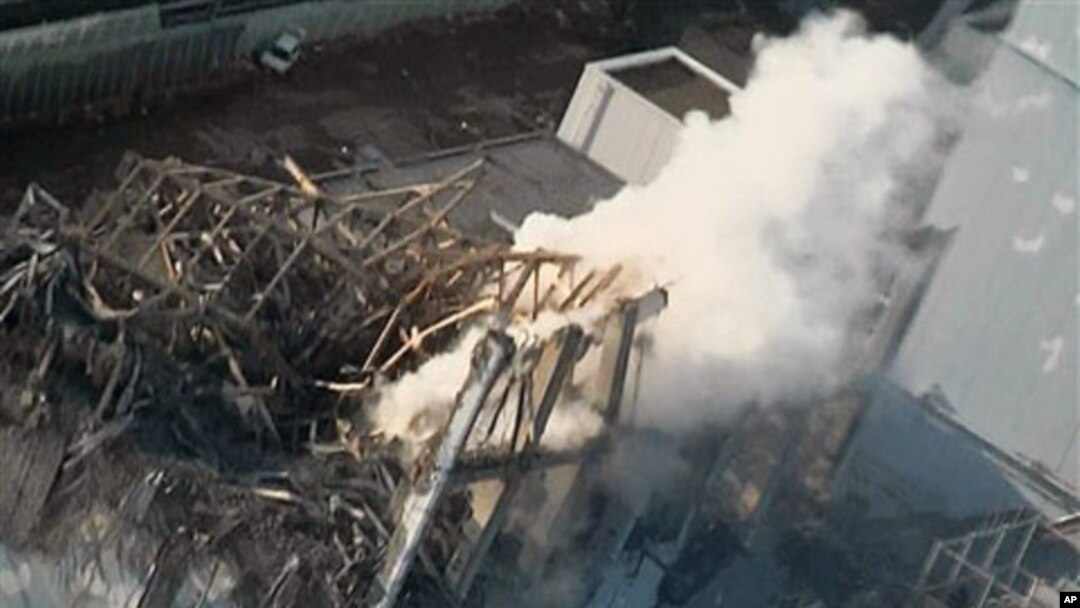 Smoke billows from wrecked unit 3 at Japan's crippled Fukushima Daiichi nuclear power plant in Okumamachi, Fukushima Prefecture, March 16, 2011