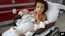 An Afghan child war victim receives treatment at the Emergency Hospital in Kabul, Afghanistan on July 25, 2016.