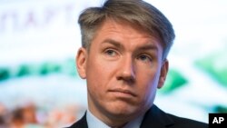 FILE - World Cup organizing committee chief executive Alexei Sorokin attends a press conference on World Cup 2018 issues in Moscow, Russia, April 29, 2015. UEFA member federations on Wednesday elected Alexei Sorokin, CEO of the 2018 World Cup organizing committee, by acclamation as one of their delegates to FIFA’s strategy-setting committee.
