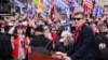 Former U.S. national security adviser Michael Flynn speaks as supporters of U.S. President Donald Trump listen during a rally to protest the results of the election in front of Supreme Court building, in Washington, U.S., Dec. 12, 2020.