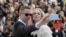 FILE - Director Nicolas Winding Refn and actress Elle Fanning pose for a selfie photograph during a photo call for the film The Neon Demon at the 69th international film festival, Cannes, southern France, Friday, May 20, 2016.