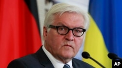 FILE - German Foreign Minister Frank-Walter Steinmeier says the Russian travel ban on EU officials works against efforts "to defuse a persistent and dangerous conflict in the middle of Europe."