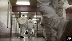 Prisoners at the William E. Donaldson prison in Bessemer, Alabama, return to their cells