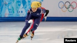 South Korea's Shim Suk Hee (R) skates ahead of China's Li Jianrou in the final sprint as South Korea goes on to win the women's 3,000 metres short track speed skating relay final event at the Iceberg Skating Palace during the 2014 Sochi Winter Olympics on February 18, 2014. 