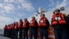 FILE - Deck crew of Taiwanese navy stand by on a Taiwan's domestically made Tuo Chiang patrol ship during a simulated attack drill off Kaohsiung City, southern Taiwan, Jan. 9, 2025.