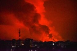 A general view shows smoke and flames at the volcanic eruption of Mount Nyiragongo near Goma, in the Democratic Republic of the Congo, May 22, 2021.