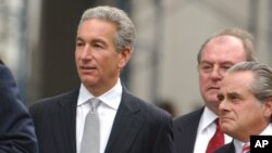 FILE - Charles Kushner, left, walks to the U.S. District Courthouse with his lawyers Benjamin Brafman, right, and Alfred C. DeCotiis, center, in Newark, N.J., Aug. 18, 2004. 