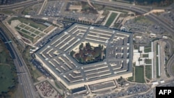 FILE - In this photo taken on October 30, 2018, the Pentagon is seen from an airplane over Washington, DC. 