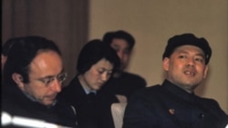 FILE - Jonathan Mirsky, left, met with Yao Wenyuan, right, a top Chinese official, in Beijing on a trip organized by the Committee of Concerned Asian Scholars in March 1972.