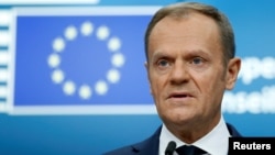 European Council President Donald Tusk addresses a news conference during a European Union leaders summit in Brussels, Belgium, Dec. 15, 2017.