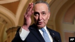 Senate Minority Leader Chuck Schumer, D-N.Y., speaks to reporters ahead of President Donald Trump's first State of the Union address, at the Capitol in Washington, Jan. 30, 2018.