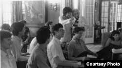 Seiji Ozawa talks with Leonard Bernstein during a lecture for Tanglewood students in this undated file photo. (Walter H. Scott)