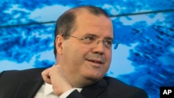 FILE - Brazilian central bank President Alexandre Tombini, pictured at the World Economic Forum in Davos, Switzerland, in 2014, has not ruled out selling part of the country's $371 billion foreign reserves to calm the exchange rate market.