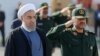 حسن روحانی رئیس جمهوری ایران (چپ) و محمدعلی جعفری فرمانده کل سپاه پاسداران