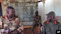 An April 14, 2012 photo shows Sudan Peoples Liberation Army (SPLA) troops at their position in the Unity Oil Field near the front lines at Heglig. 