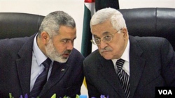 Prezidan otorite palestinyen an Mahmoud Abbas adwat ak and Premye minis Palestinyen an Ismail Haniyeh pou pati Hamas la agoch (foto achiv)