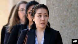 FILE - In this Sept. 12, 2019 file photo, Tiffany Li arrives at the courthouse in Redwood City, Calif.