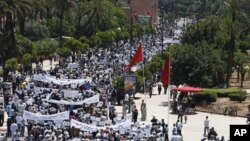 A rally organized by the 20th February, the Moroccan Arab Spring movement in Marrakech, Morocco, Sunday May 8, 2011, to protest against the terrorism following a bomb explosion in Marrakech.(AP)