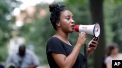 University of North Carolina student Gabrielle Johnson speaks to a crowd gathered at a Confederate monument protest on campus in Chapel Hill, N.C., Aug. 31, 2017.