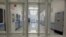 FILE - An empty corridor is seen a correctional facility in Baldwin, Michigan, Nov. 3, 2005. Plans for an immigrant detention center in Ionia, Michigan, have been suspended. 