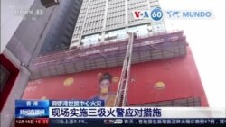 Manchetes Mundo 15 Dezembro: Hong Kong: Dezenas de pessoas ficaram presas no telhado de um arranha-céus após um grande incêndio