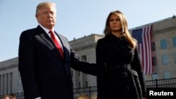 U.S. President Donald Trump and first lady Melania Trump attend the 9/11 observance at the National 9/11 Pentagon Memorial in Arlington, Virginia, Sept.11, 2017. 