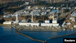 FILE - An aerial view shows Tokyo Electric Power Co.'s (TEPCO) tsunami-crippled Fukushima Daiichi nuclear power plant in Fukushima Prefecture, March 11, 2013. 