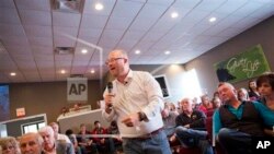 In this Sunday April 10, 2016 photo, lead pastor Richie Clendenen speaks during a service at the Christian Fellowship Church in Benton, Ky. (AP Photo/David Goldman)