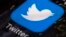 FILE - The Twitter app icon is seen on a mobile phone in Philadelphia, April 26, 2017.