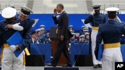 President Barack Obama congratulates graduates of the 2012 class of the U.S. Air Force Academy in Colorado Springs, Colorado, May 23, 2012.