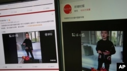 Computer screens display a video clip showing U.S. President Donald Trump's granddaughter Arabella Kushner singing a Chinese New Year greeting song that garnered almost 20 million views in Beijing, China, Feb. 3, 2017.