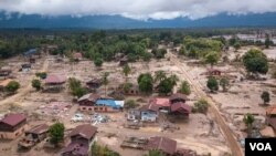 A scene of recent flooding in Laos. A new UN global warming report says the world is already seeing the effects of warming with increasing and more powerful natural disasters.