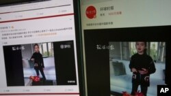 Computer screens display a video clip showing U.S. President Donald Trump's granddaughter Arabella Kushner singing a Chinese New Year greeting song that garnered almost 20 million views in Beijing, China, Feb. 3, 2017.