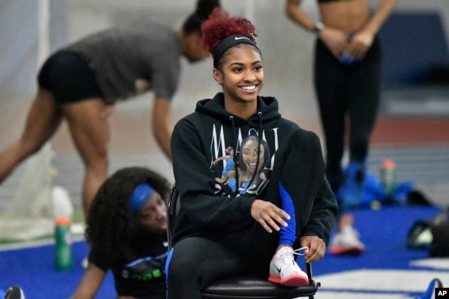 FILE - University of Kentucky track & field athlete Masai Russell during practice at the Nutter Field House in Lexington, Kentucky on Feb. 18, 2022. (AP Photo/Timothy D. Easley)