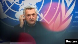FILE - The United Nations High Commissioner for Refugees (UNHCR) Filippo Grandi attends a news conference at the U.N. in Geneva, Oct. 8, 2021.