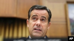 FILE - Rep. John Ratcliffe, R-Texas, questions former special counsel Robert Mueller as he testifies before the House Intelligence Committee on his report on Russian election interference, on Capitol Hill in Washington, July 24, 2019.