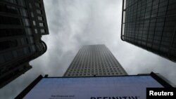 An advertisement for Refinitiv is seen on a screen in London's Canary Wharf financial centre, London, Britain, Oct. 2, 2018. 