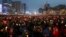 Protesters hold candles during a rally calling for South Korean President Park Geun-hye to step down in Seoul, South Korea, Dec. 24, 2016. The letters read "Arrest, Park Geun-hye."