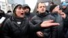 Pro-Russian supporters take part in a rally outside the regional administration in Donetsk, March 17, 2014. 