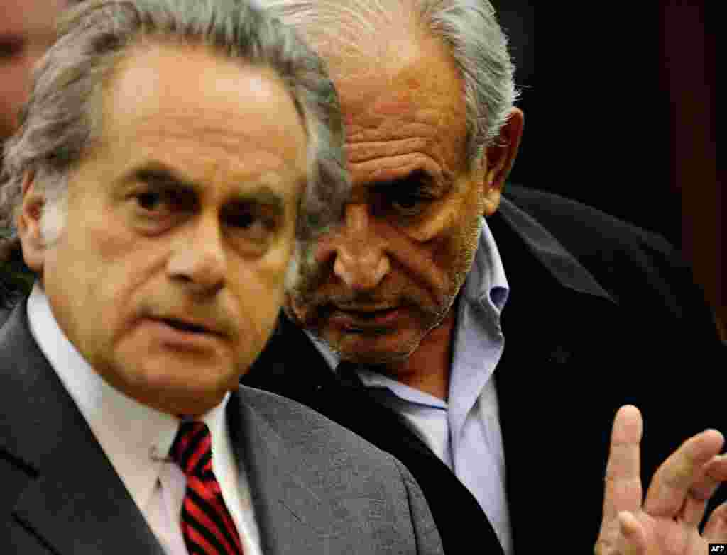 May 16: Dominique Strauss-Kahn, head of the International Monetary Fund, right, with his attorney Benjamin Brafman, is arraigned at Manhattan Criminal Court in New York, on charges he sexually assaulted a hotel maid on Saturday. (AP Photo)