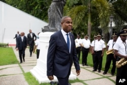 Haiti's prime minister Jean-Henry Ceant walks after his ratification ceremony at the national palace in Port-au-Prince, Haiti, Sept. 17, 2018.