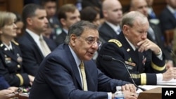 Defense Secretary Leon Panetta, left, accompanied by Joint Chiefs Chairman Gen. Martin Dempsey, testifies on Capitol Hill, April, 19, 2012, before the House Armed Services Committee hearing on recent developments with the crisis in Syria.