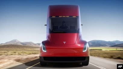 Tesla Presents Electric Truck Updated Sports Car