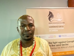 Drani Stephen, a traditional leader in the northern part of Uganda, says the problem of land corruption in his country is sometimes caused by conflicts in other countries, resulting in refugees illegally seeking land. (Columbus Mavhunga/VOA)