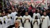 Clergymen attend Christmas celebrations at Manger Square outside the Church of the Nativity in Bethlehem, in the Israeli-occupied West Bank, Dec. 24, 2018.