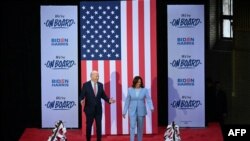 (FILES) US President Joe Biden and Vice President Kamala Harris arrive to speak at a campaign event in Philadelphia, Pennsylvania, on May 29, 2024.