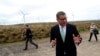 FILE - COP26 President Alok Sharma attends an event at Whitelee Windfarm, outside Glasgow, Scotland, May 14, 2021. 