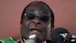 លោក​​ប្រធានាធិបតី​ Robert Mugabe នៃប្រទេស​ហ្សីមបាវ៉េ។​